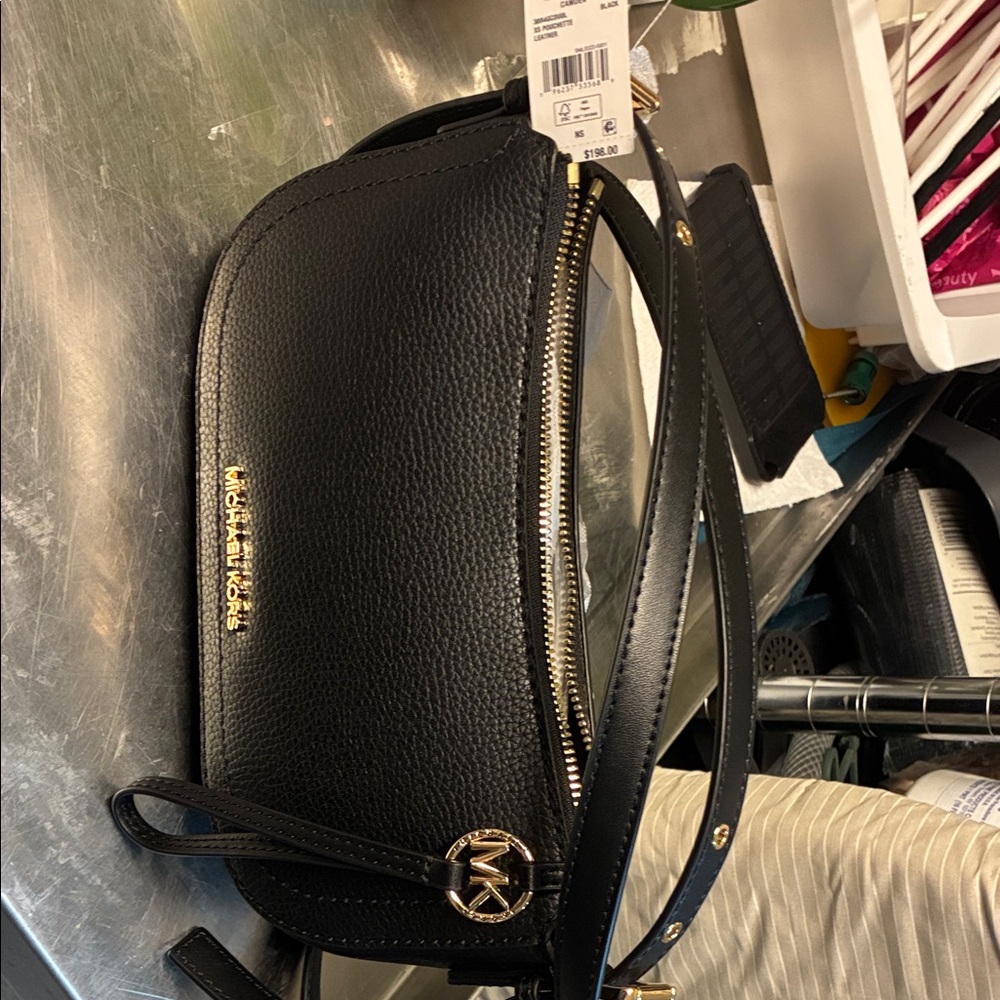 The Michael Kors Camden Small Messenger Bag